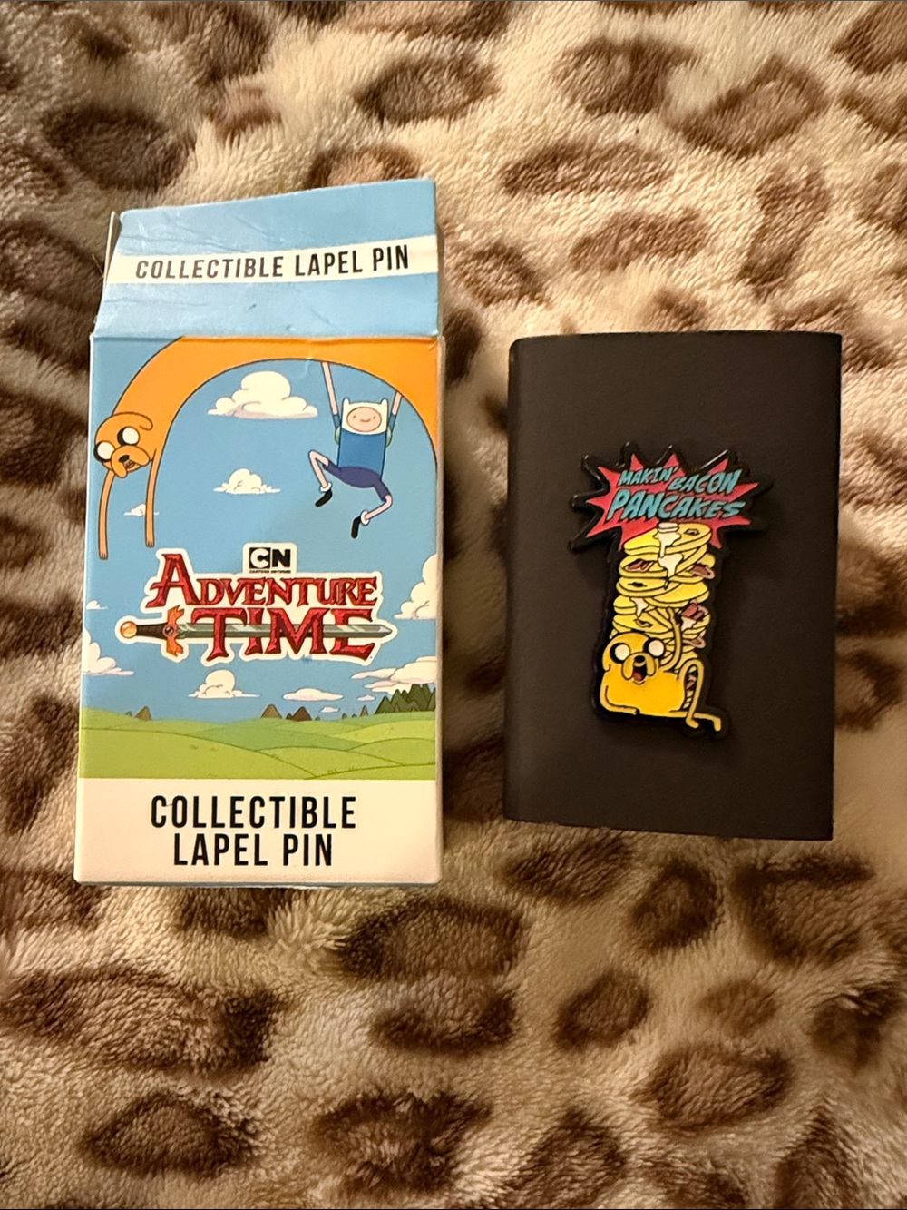 Adventure Time yellow Jake Bacon Pancakes Enamel Pin with teal and red accents